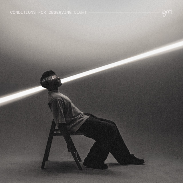 Cephas Azariah conditions for observing light cover showing a seated man beneath a diagonal beam of light in a monochrome room.